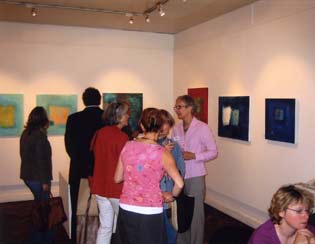 The artist with visitors to the gallery